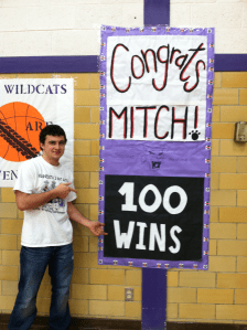 Mitchell Breuer with 100 Win Banner